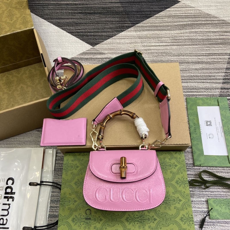 G*u*i top handle bags